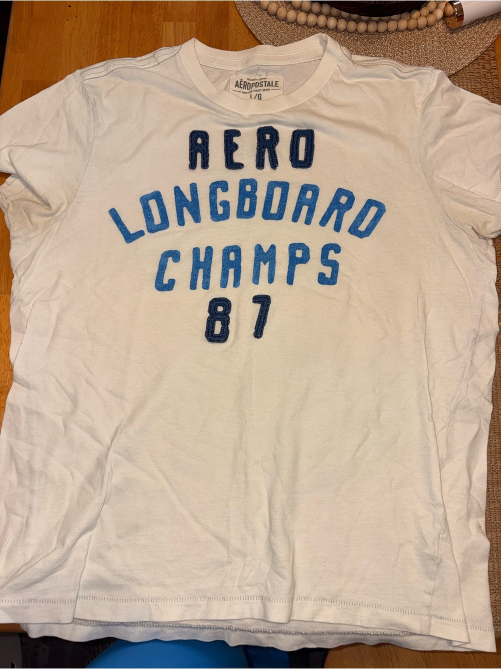 Aeropostale White Short-Sleeve Tee with Blue 'Longboard Champs 87' Graphic